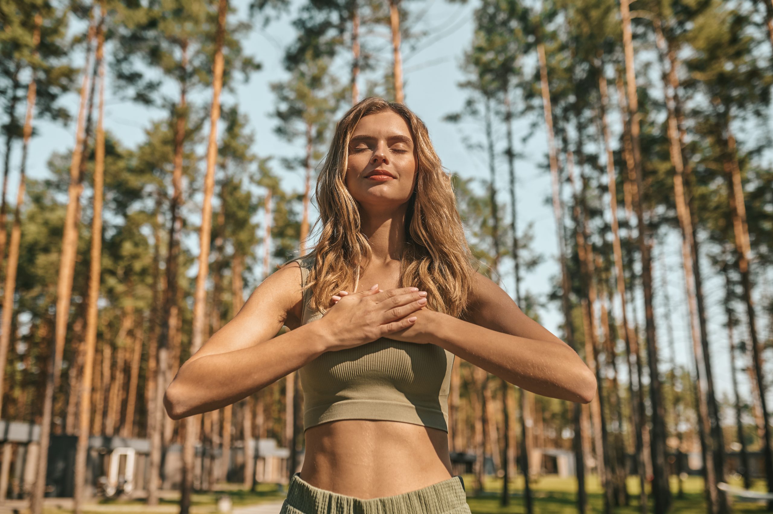 Woman practicing yoga and mindful breathing